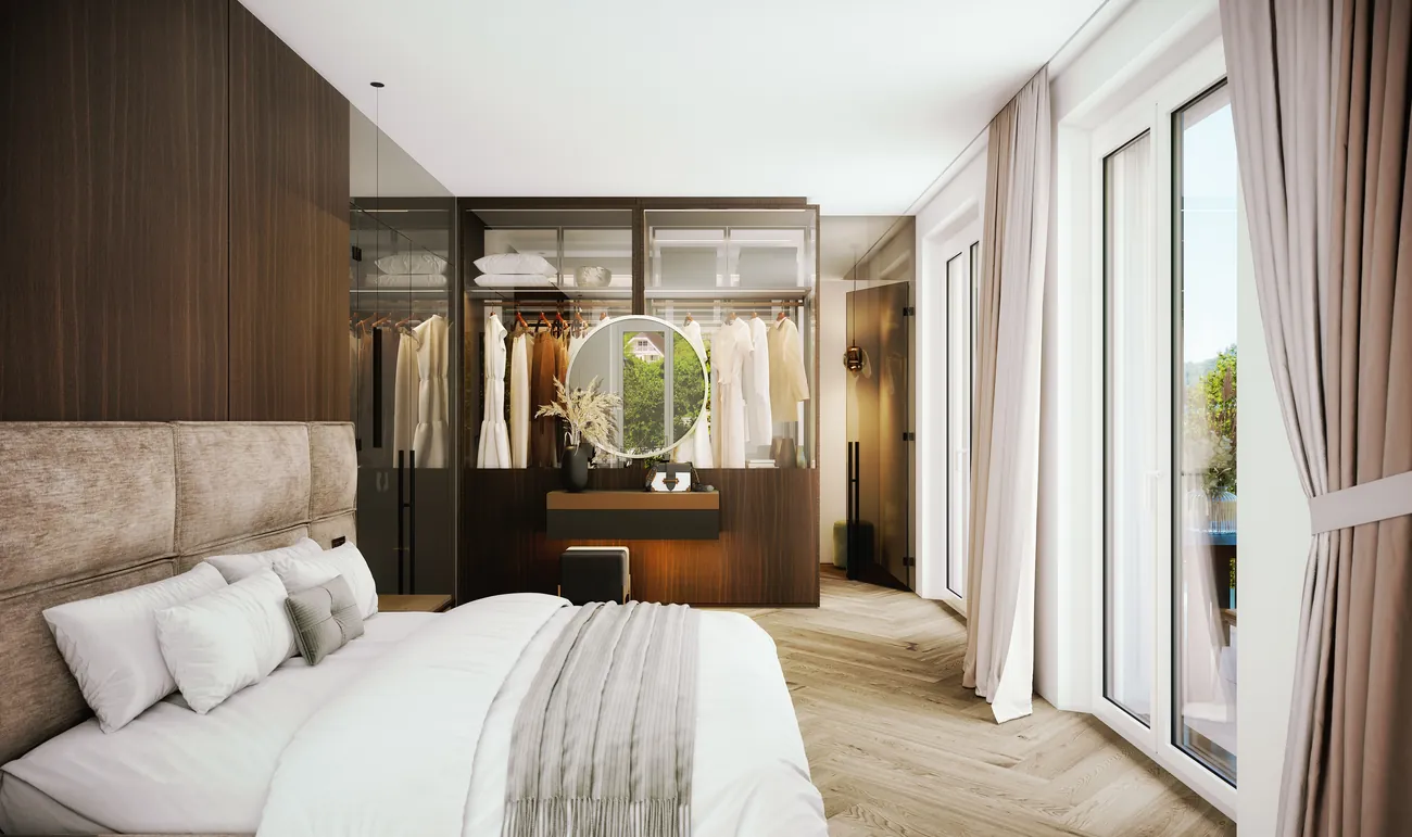 Schlafzimmer mit begehbarer Ankleide und Naturparkett